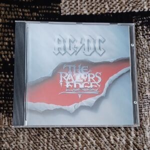 4/$60 AC/DC "The Razors Edge" - CD
